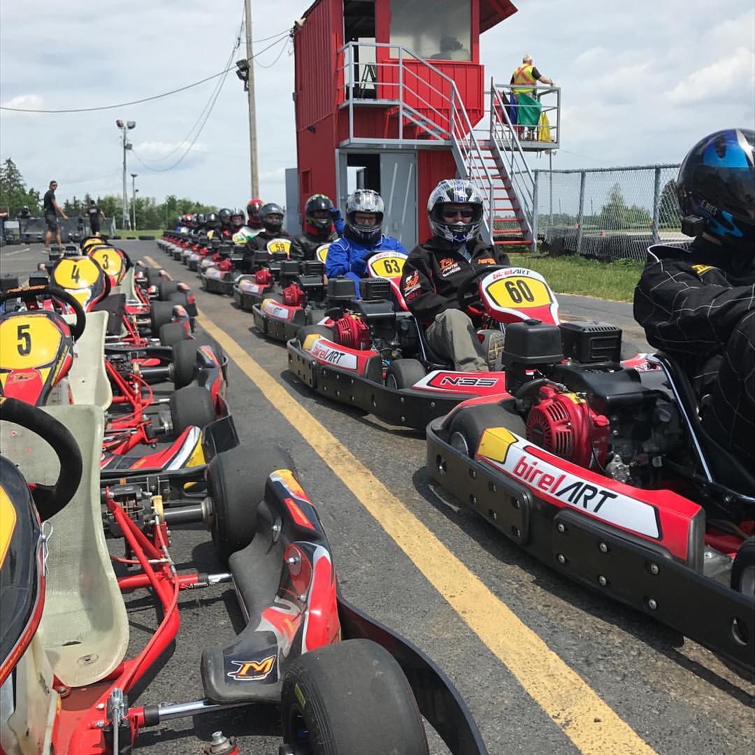 Photo of go-karts with drivers at the Canadian Mini Indy