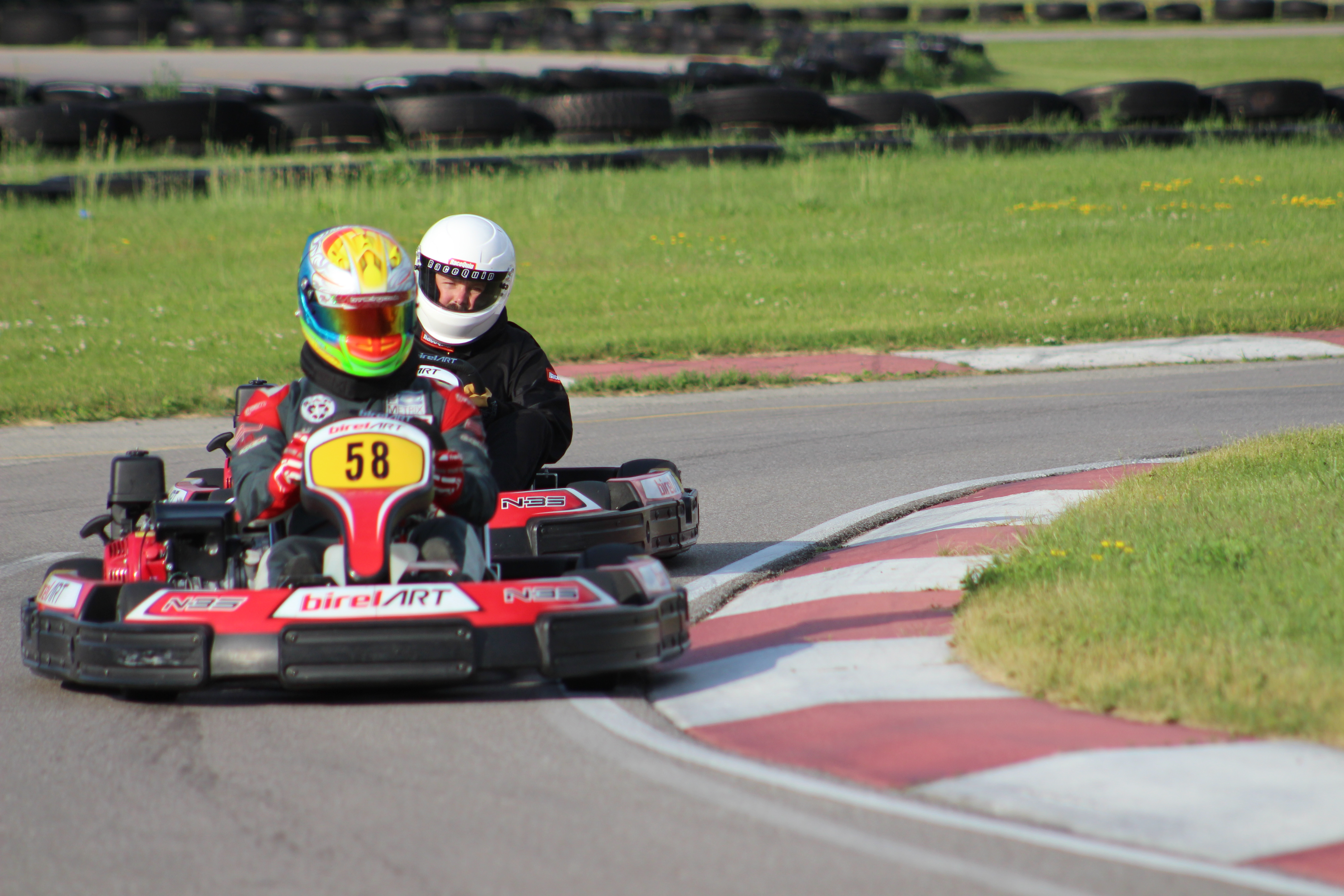 Photo of two go-kart drivers racing at the Canadian Mini Indy